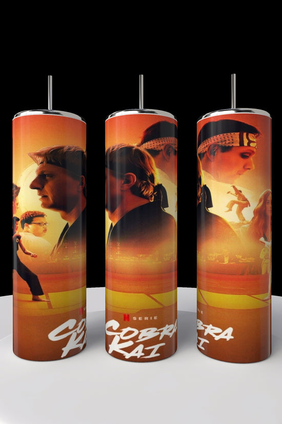 A set of three 20oz Kobra Kai stainless steel tumblers by Kreative Kreationz, each vividly sublimated with series characters in action against dynamic orange and red backdrops, prominently showcasing the 