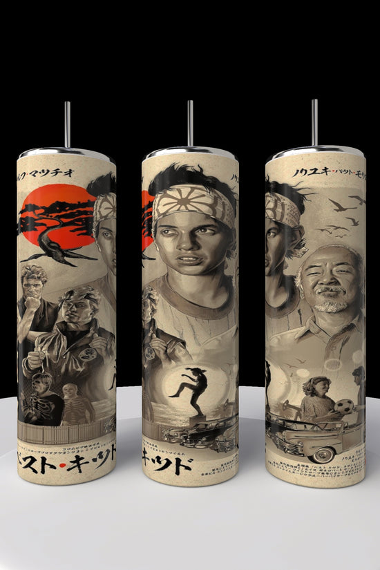 Three creatively decorated, upright cylinders from Kreative Kreationz resemble the sleek design of a 20oz stainless steel tumbler and showcase martial arts-themed illustrations, including fighters and traditional symbols against a cinematic backdrop with a prominent red sun motif.