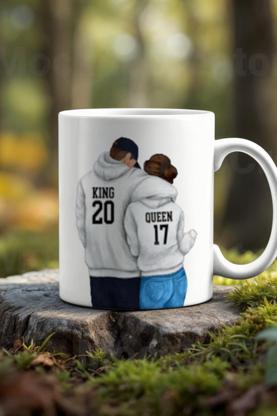 The Couples Ceramic Mug by Kreative Kreationz is a romantic high-quality gift featuring a couple in hoodies labeled 