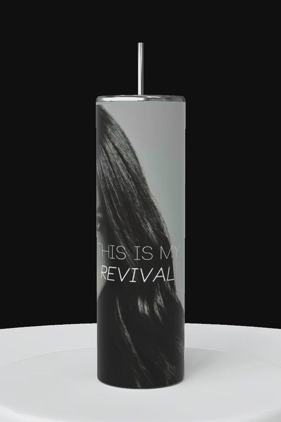 Video of 1 tall, cylindrical personalized tumbler is shown. the wrapped tumbler features the name 